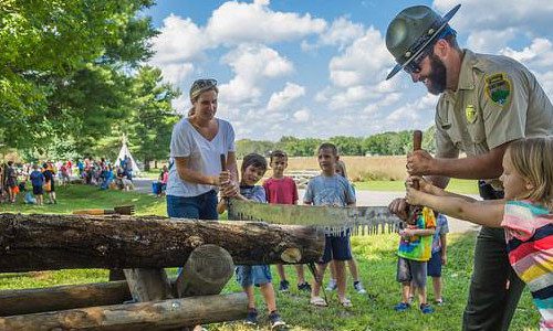 Photo of park ranger with children